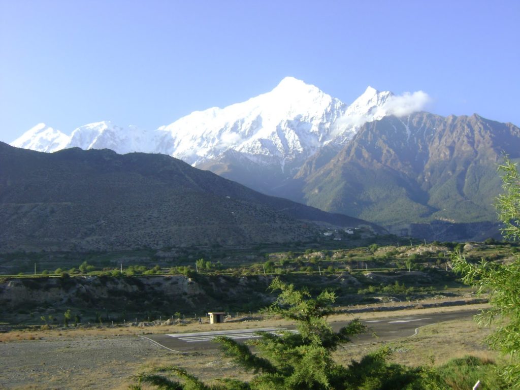 An image showing the air strip in Jhomsom with the mountain range in the background