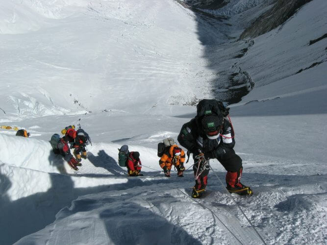 A group of climbers braving the conditions on everest