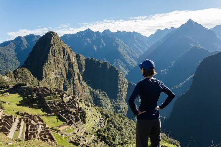 A girl looking over Machu Picchu in Cuzco