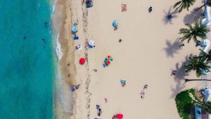 Aerial view of beach with umbrellas