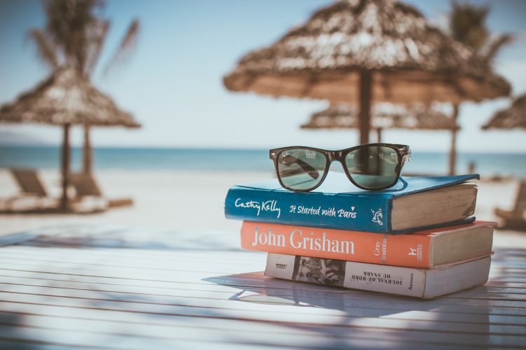 A selection of books on the beach