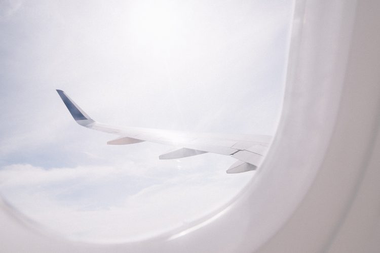 Plane wing as seen from plane window
